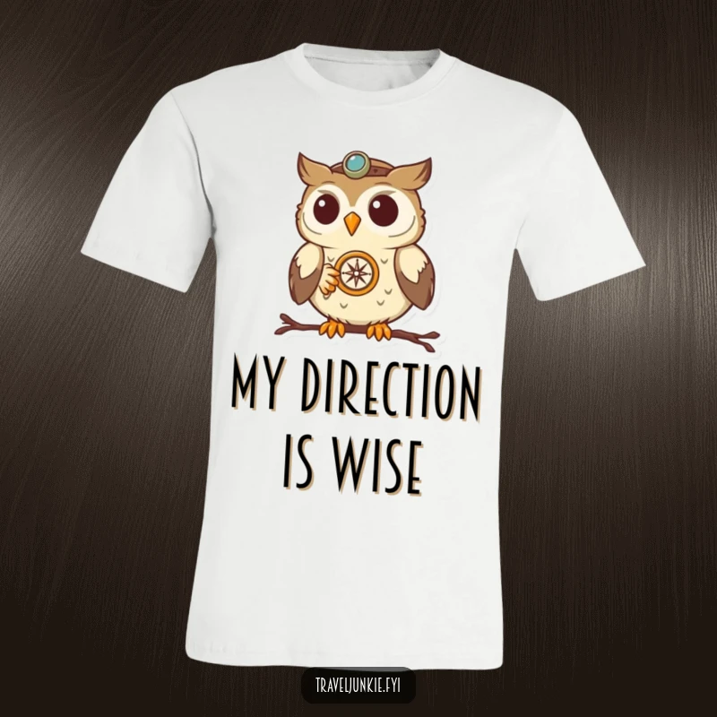 Funny Owl Navigator T-Shirt: A determined owl holding a compass, showcasing its navigational skills with a humorous twist, ideal for adventurers.
