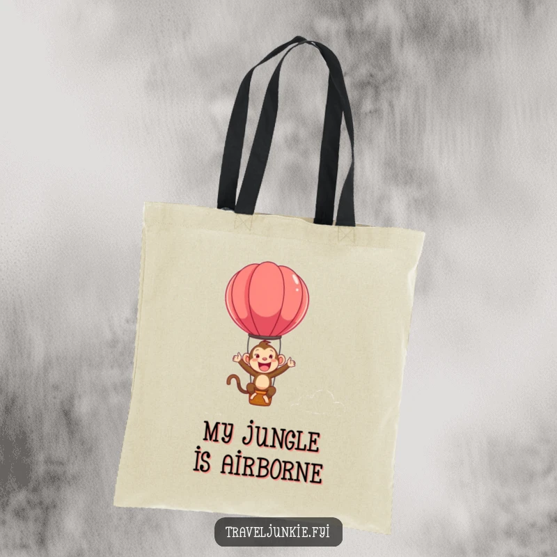 Funny tote bag with an ecstatic monkey character bouncing energetically on a hot air balloon, symbolizing fun and travel.